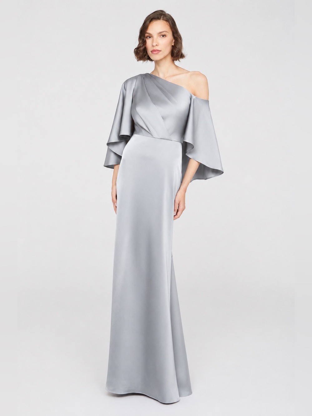 Theia Kia One-Shoulder Silver Satin Gown with Draped Cape Sleeve